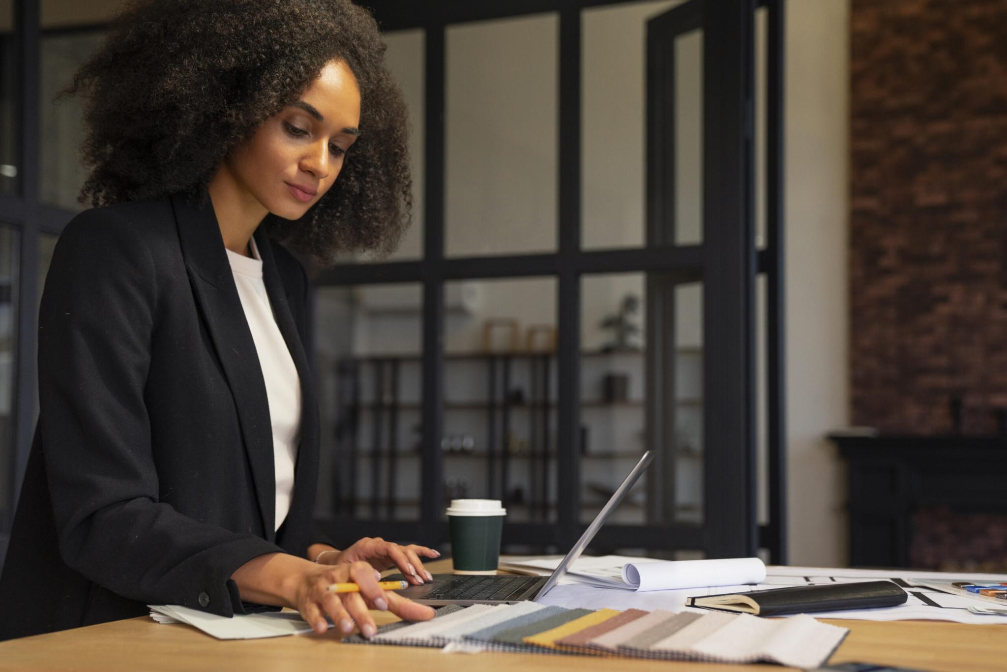 side-view-woman-working-desk